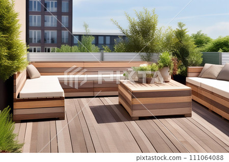 Wooden garden furniture for a green terrace with a wooden floor Wooden garden furniture for a green terrace with a wooden floor 111064088
