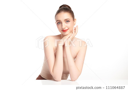 Beautiful young woman with clean fresh skin on white background, Face care, Facial treatment, Cosmetology, beauty and spa, women portrait. Beautiful young woman with clean fresh skin on white background, Face care, Facial treatment, Cosmetology, beauty and spa, women portrait. 111064887