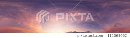Bright sunset sky panorama with glowing red pink Cirrus clouds. HDR 360 seamless spherical panorama. Sky dome or zenith in 3D, sky replacement for aerial drone panoramas. Climate and weather change. 111065062