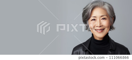 AI-generated content. Elegant, smiling, elderly, chic Asian woman with gray hair and perfect skin on a gray background banner. 111066866