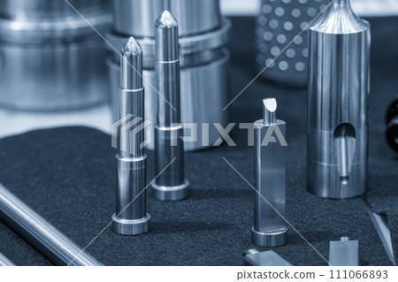 Close up scene the press die and injection mold standard parts. 111066893