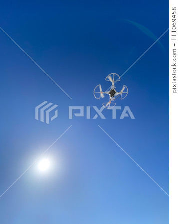Blue sky and drone 111069458