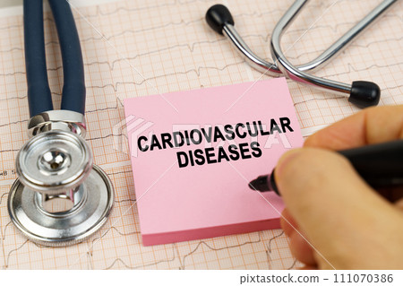 On the cardiograms there is a stethoscope and a sticker with the inscription - Cardiovascular diseases On the cardiograms there is a stethoscope and a sticker with the inscription - Cardiovascular diseases 111070386