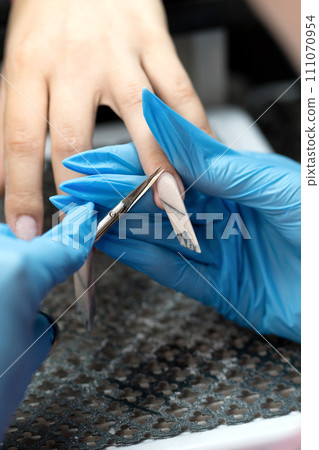 Precision Nail Shaping During EDGE Manicure Precision Nail Shaping During EDGE Manicure 111070954