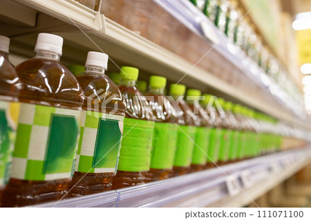 Many plastic bottled drinks on display 111071100