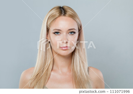 Glamorous blonde woman with long straight hair and clean fresh pure perfect skin isolated  111071996