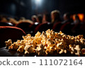 Delicious Fresh Popcorn with Copy Space in Cinema, Perfect Snack for Movie Night and Entertainment 111072164