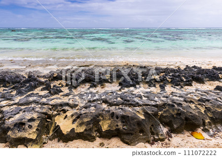 Sharp rocks at the coast of La Digue island, Anse Union Sharp rocks at the coast of La Digue island, Anse Union 111072222