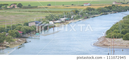 Wonderful aerial shot of fishing huts near Comacchio 111072945