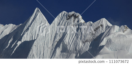 Sharp mountain ridge and peak seen from Gorakshep, Nepal. Sharp mountain ridge and peak seen from Gorakshep, Nepal. 111073672