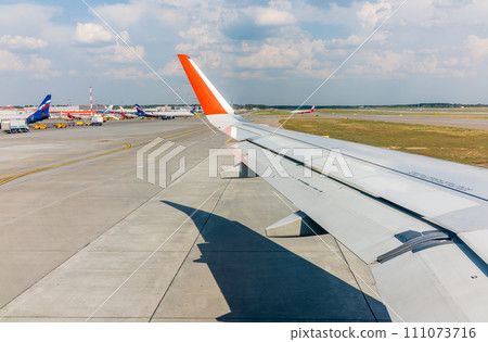 View from the airplane window during takeoff at Sheremetyevo airport at summer 111073716