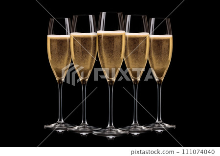 Set of crystal-clear flute glass of champagne isolated on black background Set of crystal-clear flute glass of champagne isolated on black background 111074040