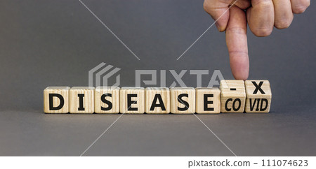 Disease X after covid symbol. Turned cubes and changed the word Disease COVID to Disease X. Beautiful grey table grey background. Doctor hand. Medical, Disease X after covid concept. Copy space. 111074623