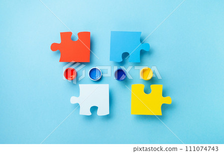 World Autism Awareness Day Card, colorful Puzzles on Blue Background. World Autism Awareness Day Card, colorful Puzzles on Blue Background. 111074743