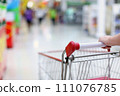 Shopping trolley in motion 111076785