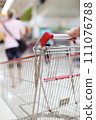Shopping trolley in motion 111076788
