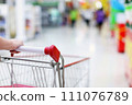 Shopping trolley in motion 111076789