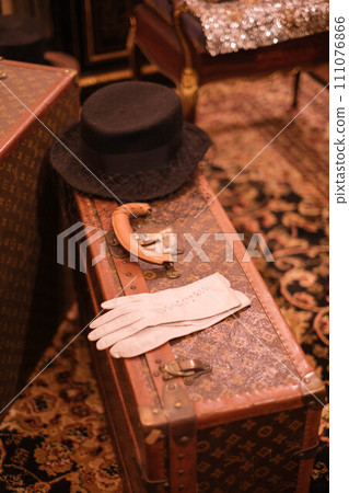 Preparing for the trip. hat, attache case 111076866