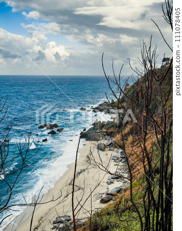 Ocean waves crashing on the beach during tempest. 111078405