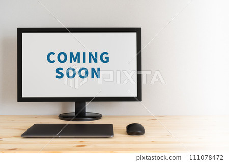 A monitor displaying the words COMING SOON A monitor displaying the words COMING SOON 111078472