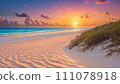 Pink sunset over sand dunes and sea 111078918