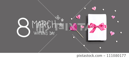 Happy Womens day message with a gift box and hearts 111080177