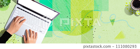 Person using a laptop computer 111080293