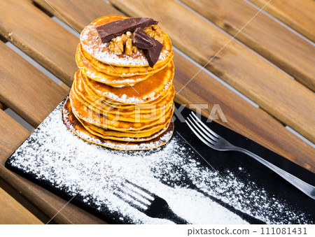 High stack of pancakes 111081431