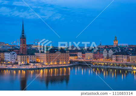Stockholm Sweden, night city skyline at Gamla Stan old town 111083314