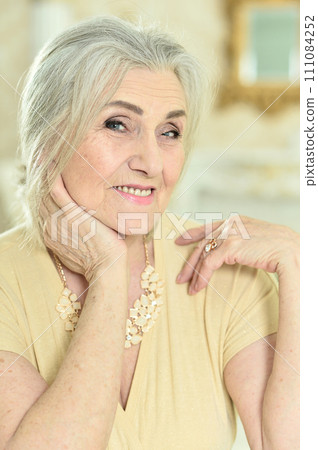 Portrait of beautiful happy woman at home 111084252
