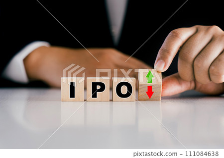 The concept of initial public offerings, IPO text on a wooden block. The concept of initial public offerings, IPO text on a wooden block. 111084638