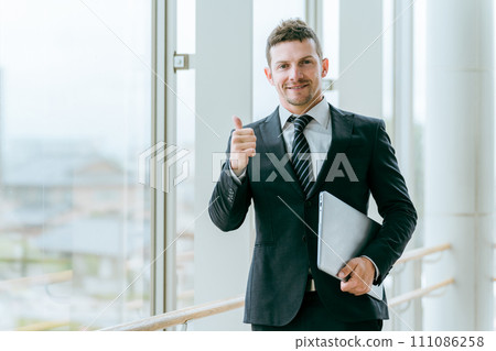 Foreign businessman giving a go sign (thumbs up, praise, success, support, like) Foreign businessman giving a go sign (thumbs up, praise, success, support, like) 111086258