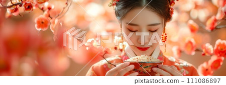a woman happily enjoying yakbap a woman happily enjoying yakbap 111086897