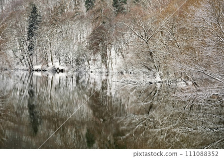 Beautiful winter landscape. Nature with trees, snow and river in winter time. Beautiful winter landscape. Nature with trees, snow and river in winter time. 111088352