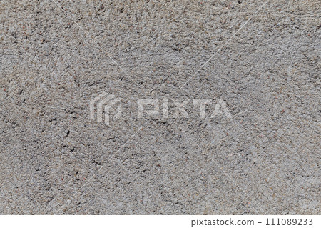 Crushed granite stones wall - close up 111089233