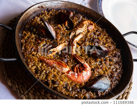 Paella with seafood 111089386