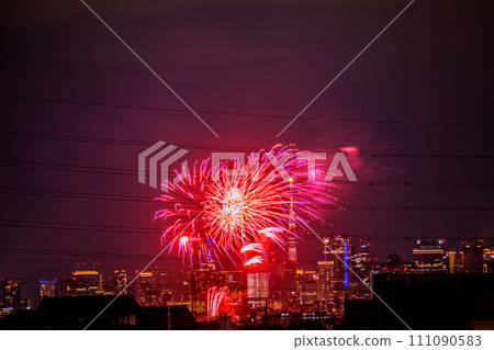 Kawasaki cityscape in Japan Tamagawa Fireworks Festival for the first time in 4 years. The venue side of the Kawasaki City Memorial Tamagawa Fireworks Festival. Roppongi Hills etc. in the back 111090583