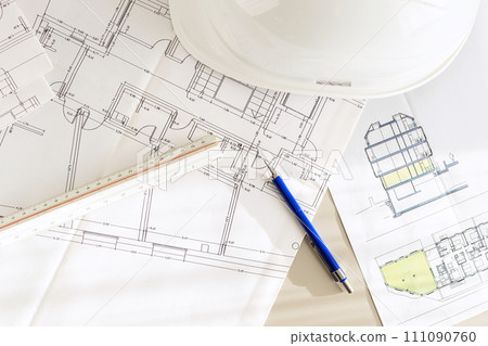 Architecture plans and architect supplies on desk Flat lay 111090760