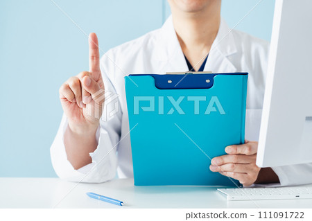 Middle male doctor showing with finger Middle male doctor showing with finger 111091722