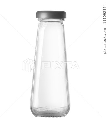 Small empty glass bottle 111092534