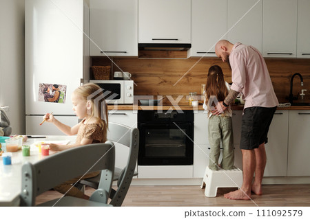 Preparing snack for breakfast together 111092579