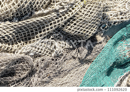 Old fishing net close-up. Old fishing net close-up. 111092620