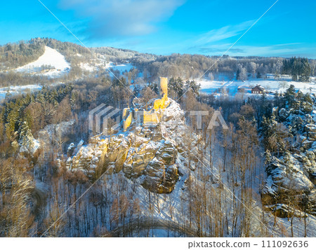 Frydstejn medieval castle ruins at cold morning sunrise time. Bohemian Paradise, Czech: Cesky raj, Czechia. Aerial view from above. 111092636