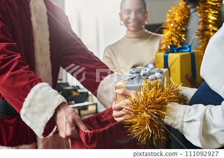 Choosing presents at Christmas party Choosing presents at Christmas party 111092927