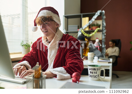 Businessman in costume of Santa Claus Businessman in costume of Santa Claus 111092962