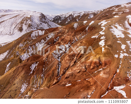 Stunning aerial view of colorful kyzyl-chin mountains, snow patches, altai, russia 111093807