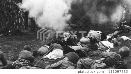 Soviet Russian Nkvd Forces Escort Civilians Under air attack. Soviet Soldiers Uniform. Evacuation Of Civilians. Black And White Soviet Russian Nkvd Forces Escort Civilians Under air attack. Soviet Soldiers Uniform. Evacuation Of Civilians. Black And White 111097283