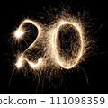 Sparkling numbers on a dark background 111098359
