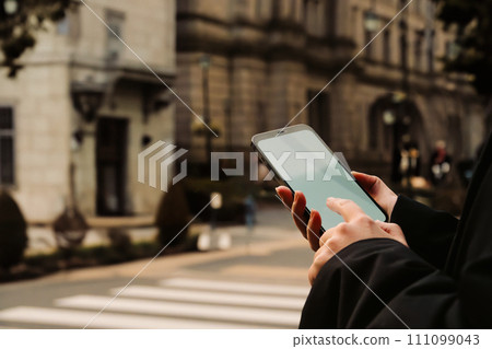 people walking around town people walking around town 111099043