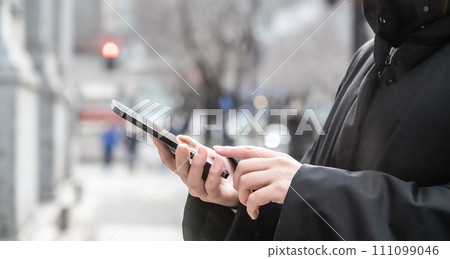 people walking around town 111099046